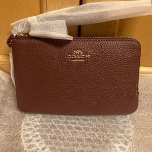Coach double wristlet. IM/Wine/multi. New/tags